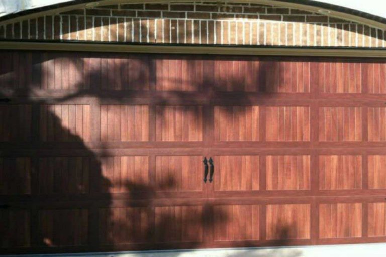 Woodlands custom garage door residential garage door.