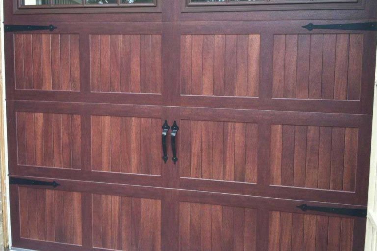 Woodlands TX garage doors with a custom wood garage door.