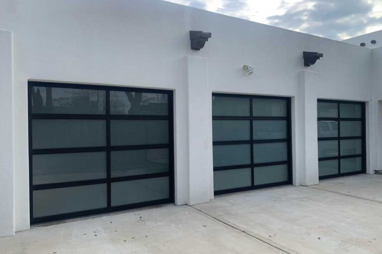 Privacy glass garage doors installed in Houston.