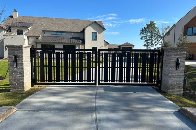 Driveway Gate In Benders Landing Newly installed driveway gate in Benders Landing Spring TX by Sentry Garage Door & Gates.