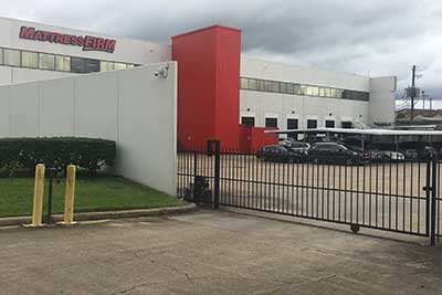 Commercial gates Houston, TX completed entry slide gate into employee parking lot project.