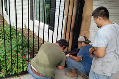 New LiftMaster gate opener being installed in Houston.