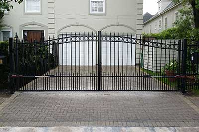 Electric gate in Houston TX end of driveway.