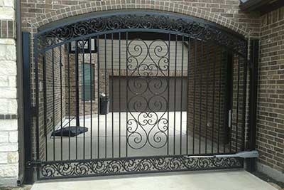 Decorative iron gate installed in The Heights.
