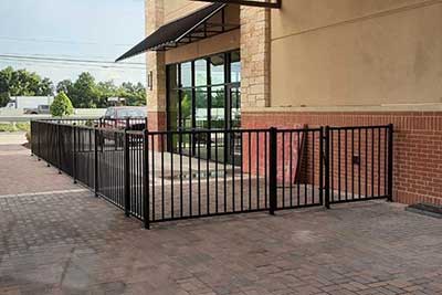 Iron fence commercial building in Houston, TX.