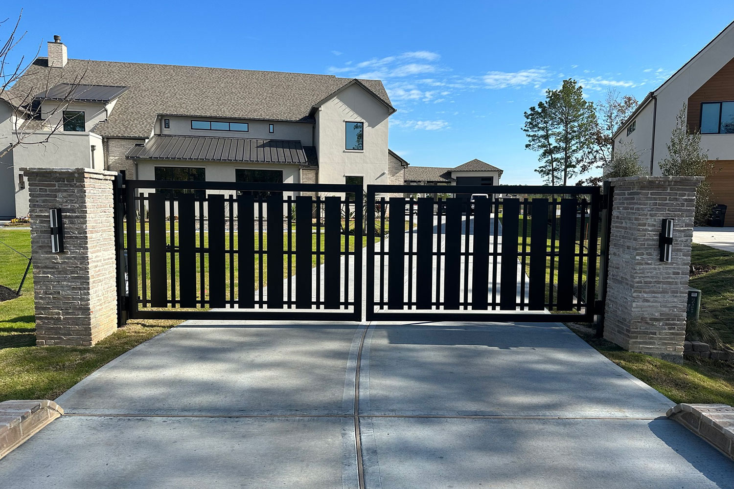 Custom made driveway gate installed by Sentry in Benders Landing subdivision Porter Heights.